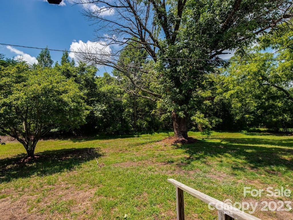 2589 Fay Jones Road Denver, NC 28037 - Photo 3 of 15 a view of a garden with large trees