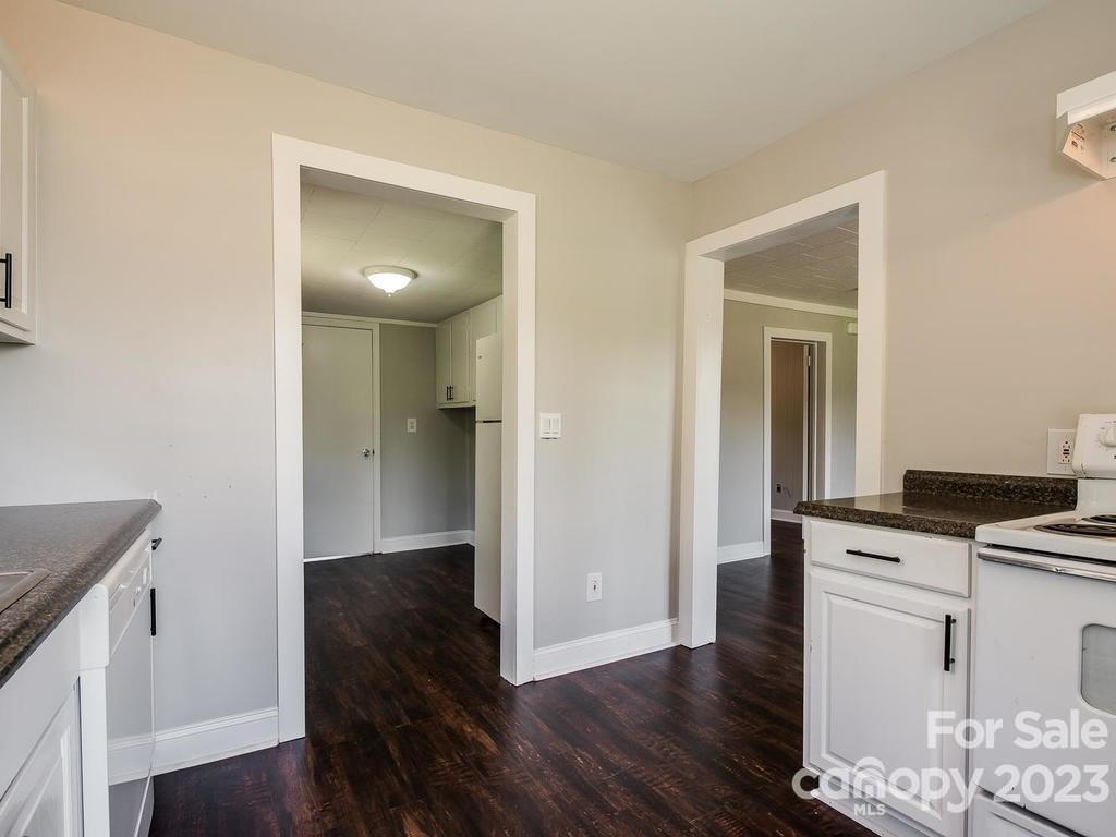 2589 Fay Jones Road Denver, NC 28037 - Photo 4 of 15 a view of a kitchen cabinets and wooden floor
