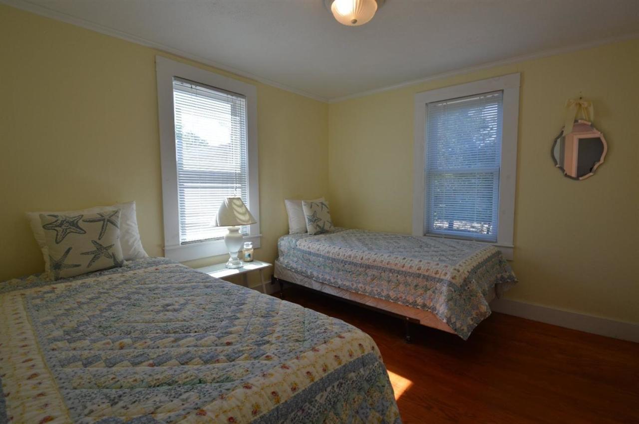 20 Sunset Lane Barnstable, MA 02630 - Photo 12 of 19 a bedroom with two beds and a window