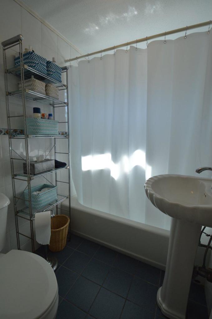 20 Sunset Lane Barnstable, MA 02630 - Photo 13 of 19 a bathroom with a sink toilet and shower