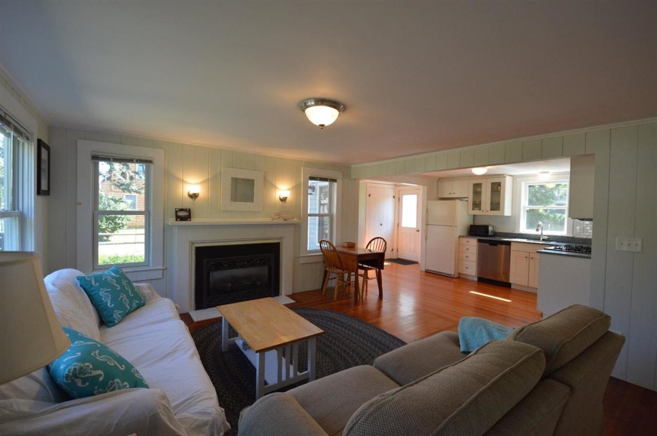 20 Sunset Lane Barnstable, MA 02630 - Photo 4 of 19 a living room with furniture and a fireplace