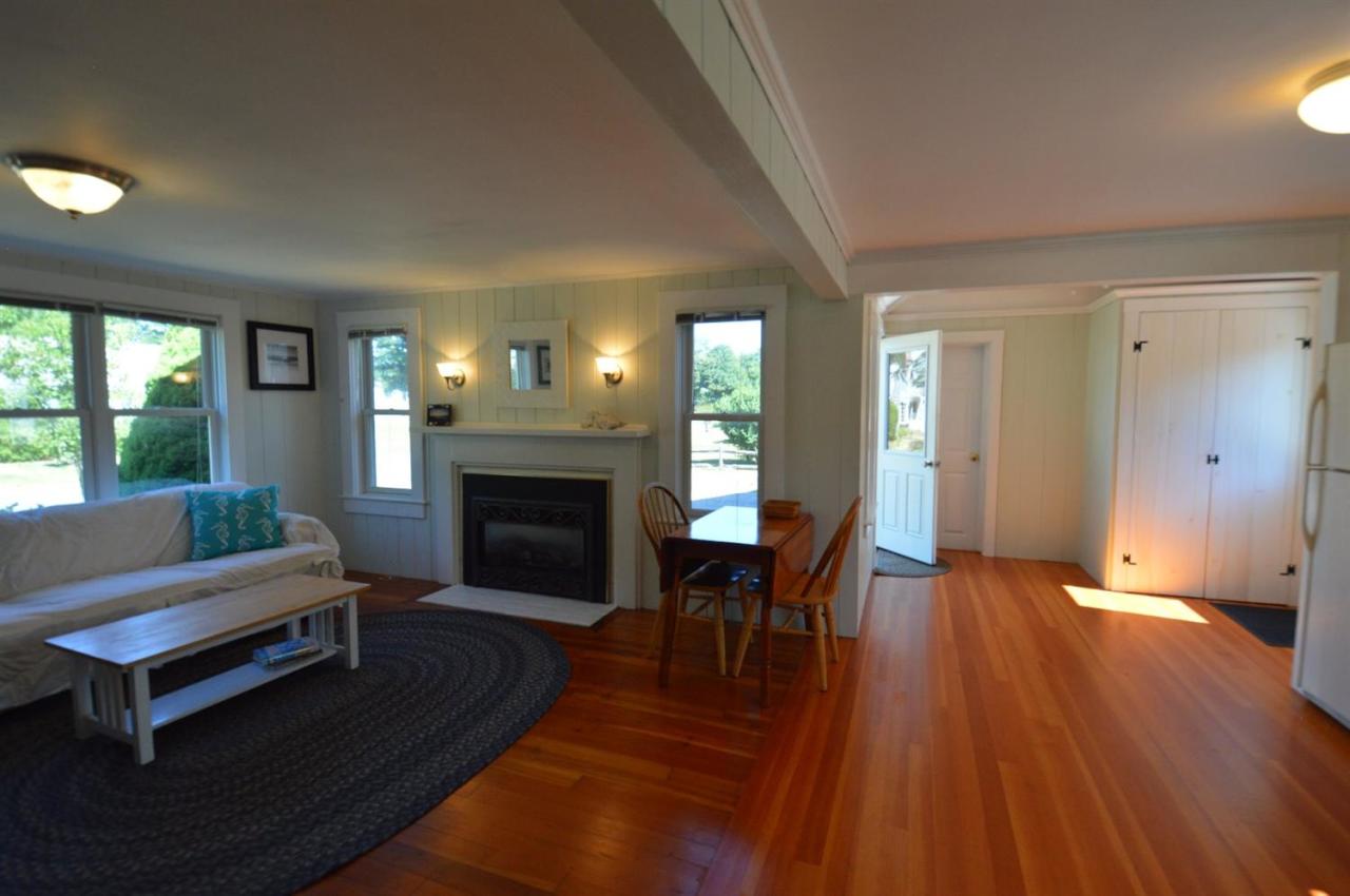 20 Sunset Lane Barnstable, MA 02630 - Photo 5 of 19 a living room with furniture and a fireplace