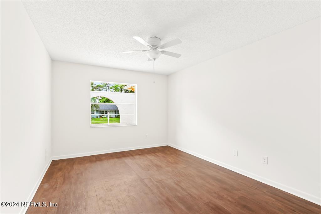 968 Espinado Avenue St. Augustine, FL 32086 - Photo 12 of 36 a view of an empty room with a window