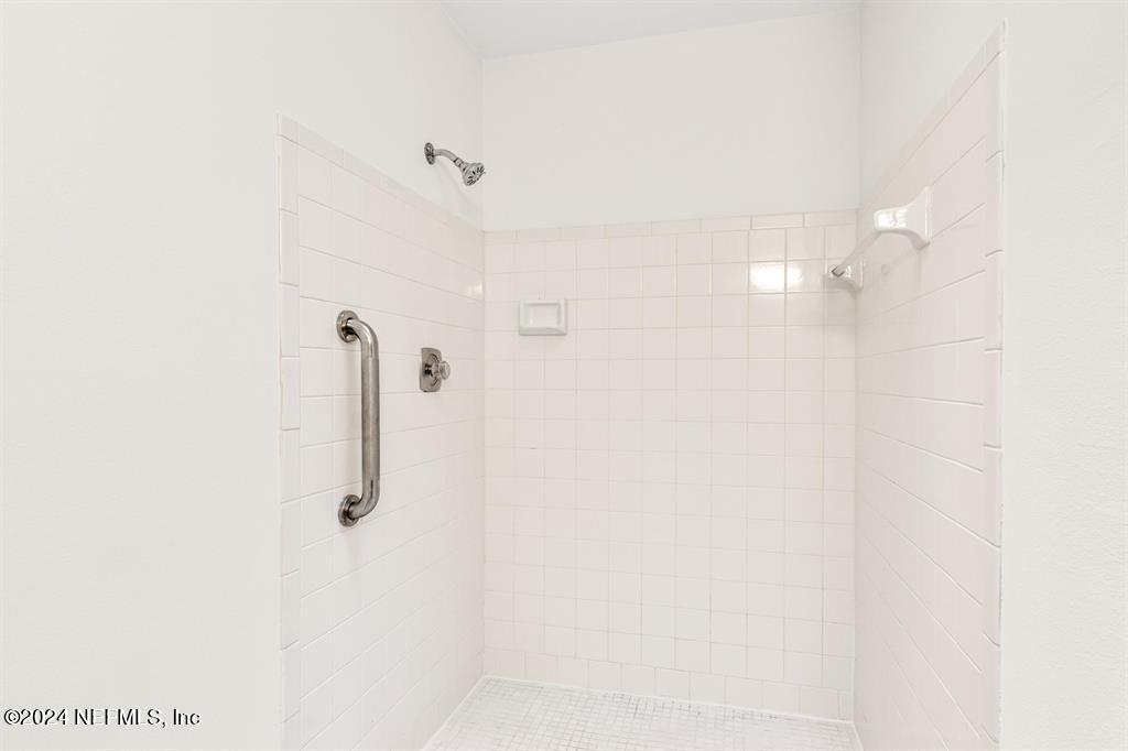 968 Espinado Avenue St. Augustine, FL 32086 - Photo 17 of 36 a bathroom with a shower