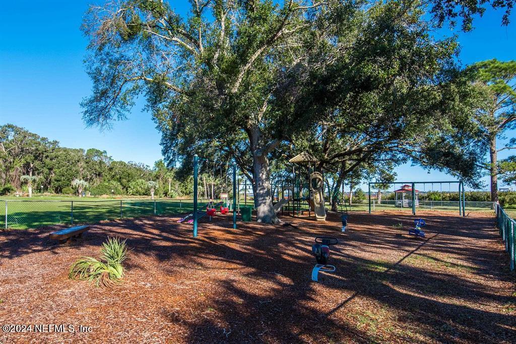 968 Espinado Avenue St. Augustine, FL 32086 - Photo 34 of 36 a view of street with trees