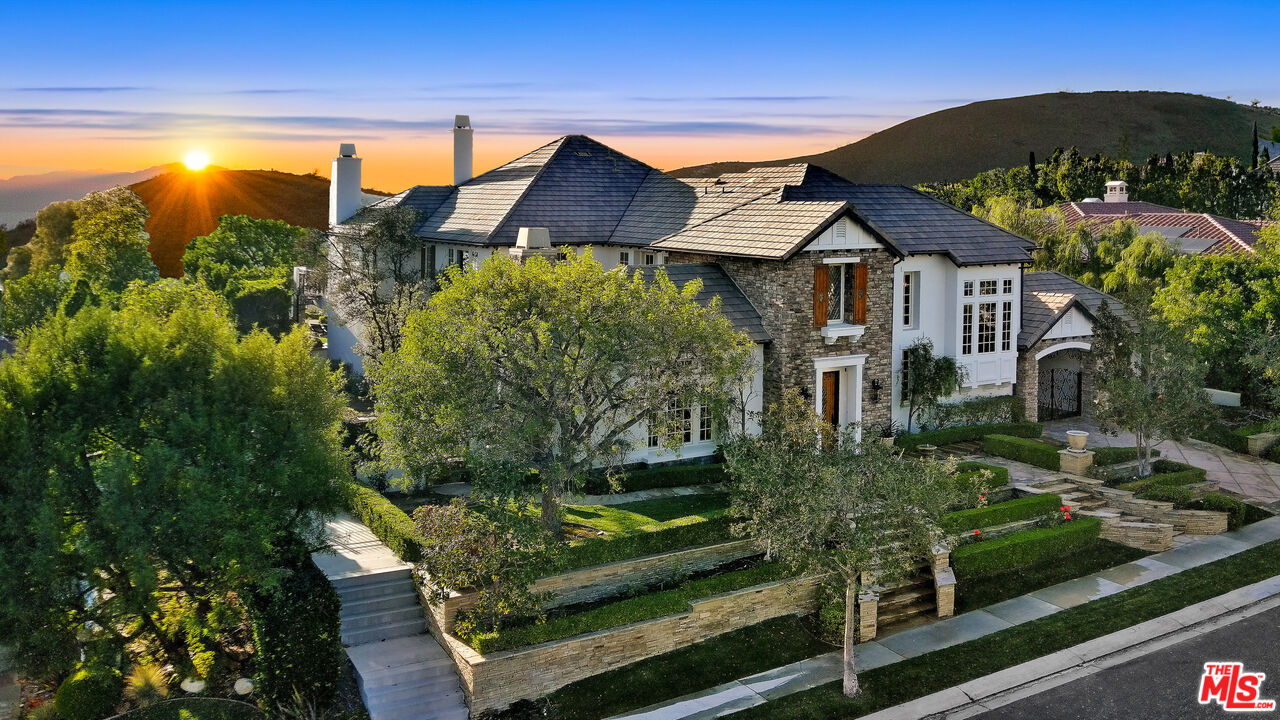 25430 Prado De Azul Calabasas, CA 91302 - Photo 2 of 51 a view of a house with a yard