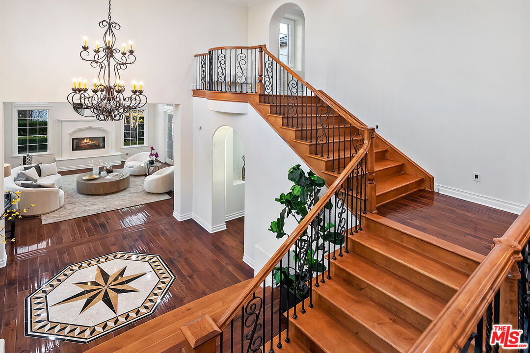 25430 Prado De Azul Calabasas, CA 91302 - Photo 14 of 51 a view of entryway livingroom and hall with wooden floor