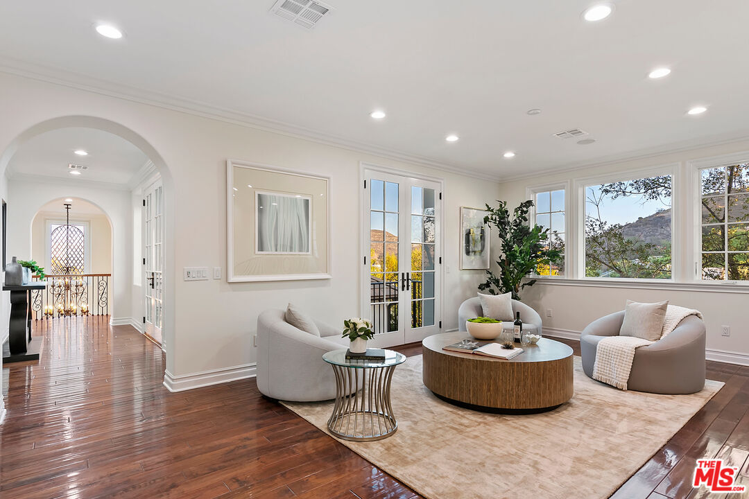 25430 Prado De Azul Calabasas, CA 91302 - Photo 18 of 51 a living room with furniture and a large window