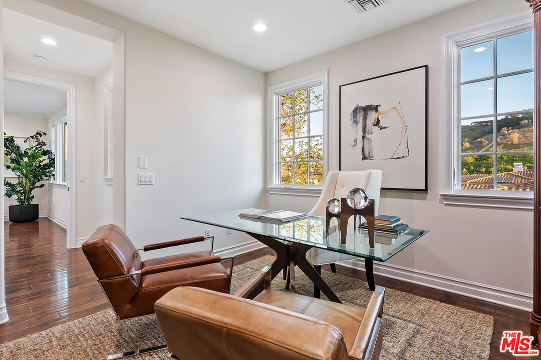 25430 Prado De Azul Calabasas, CA 91302 - Photo 28 of 51 a living room with furniture and a potted plant