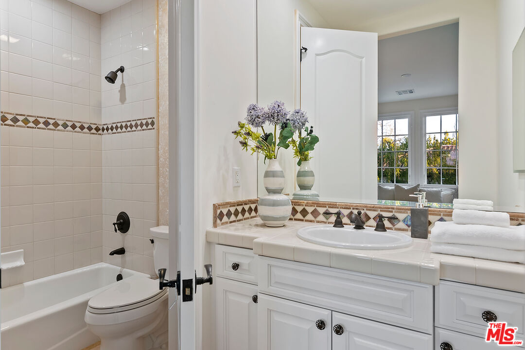 25430 Prado De Azul Calabasas, CA 91302 - Photo 30 of 51 a bathroom with a sink a toilet and a bathtub