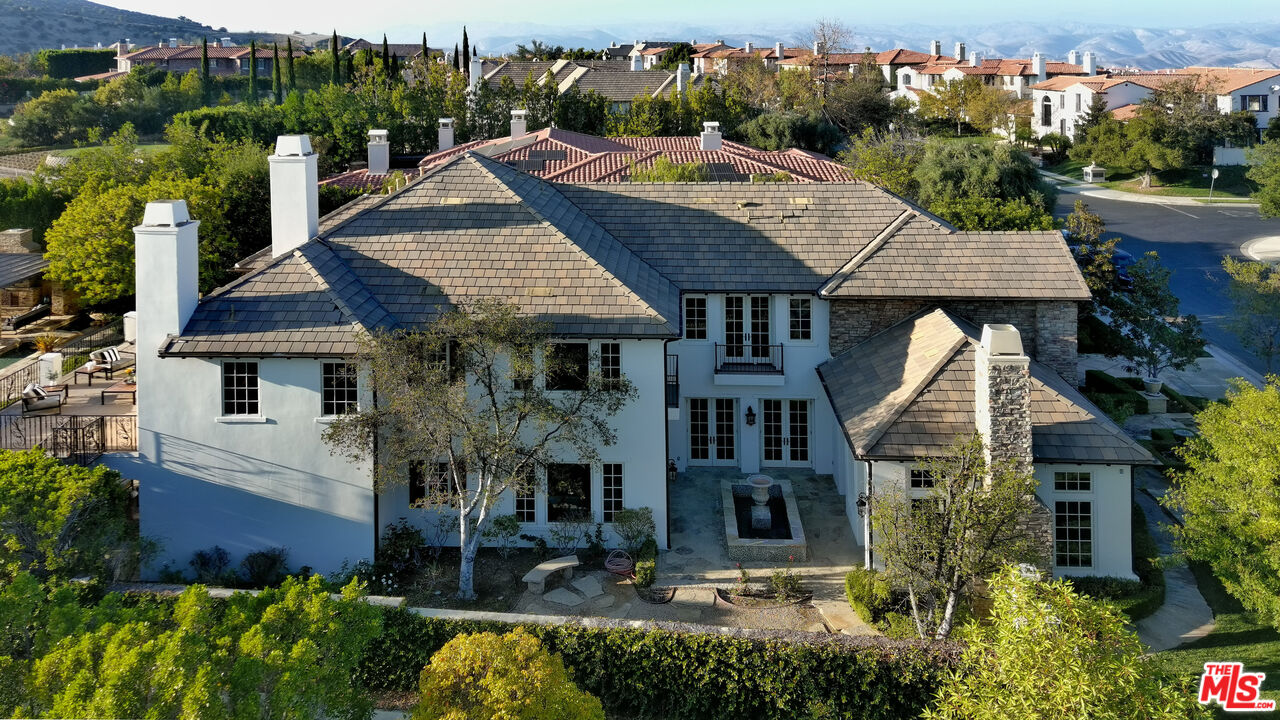 25430 Prado De Azul Calabasas, CA 91302 - Photo 49 of 51 a aerial view of a house with yard and green space