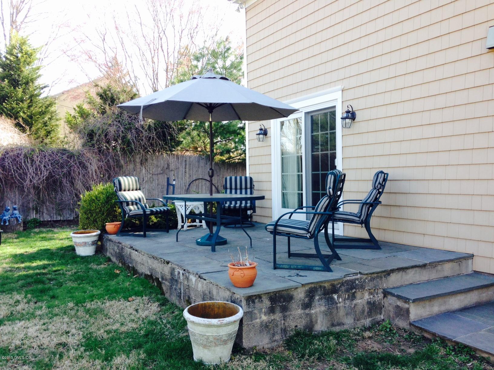 16 Orchard Street Cos Cob, CT 06807 - Photo 16 of 24 a garden view with a seating space