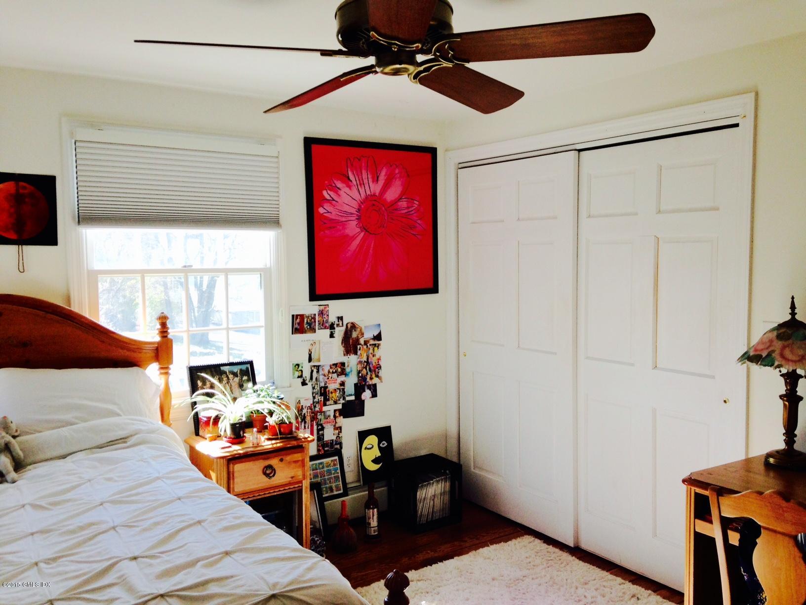 16 Orchard Street Cos Cob, CT 06807 - Photo 24 of 24 a room with furniture a rug and a window