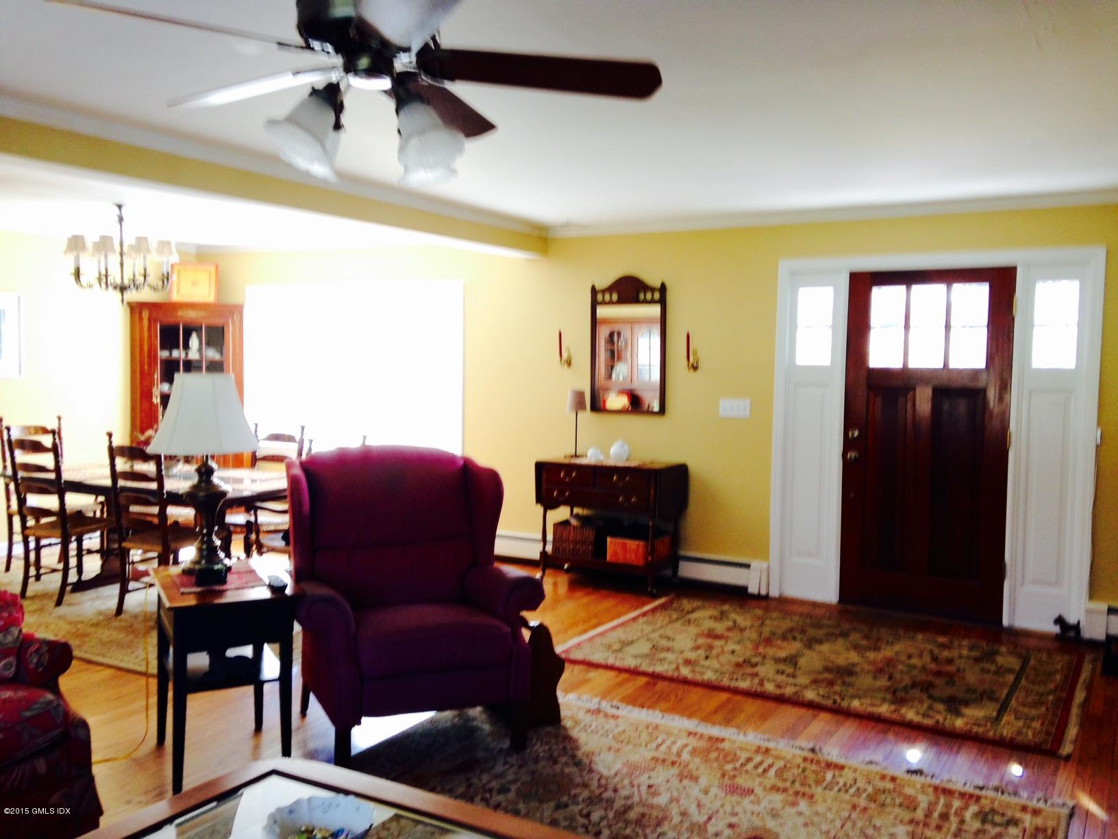 16 Orchard Street Cos Cob, CT 06807 - Photo 3 of 24 a living room with furniture and a rug