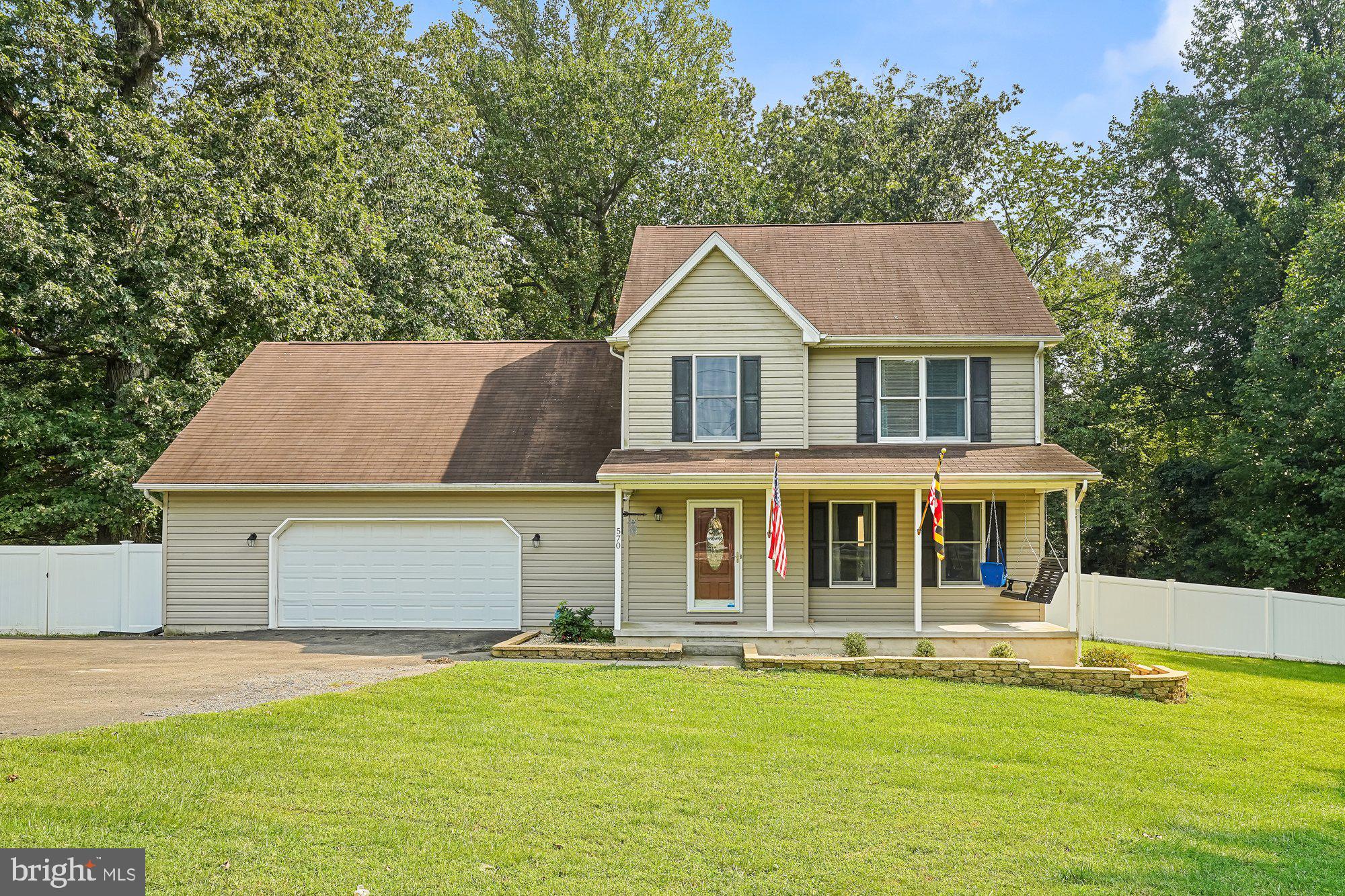 a front view of a house with swimming pool