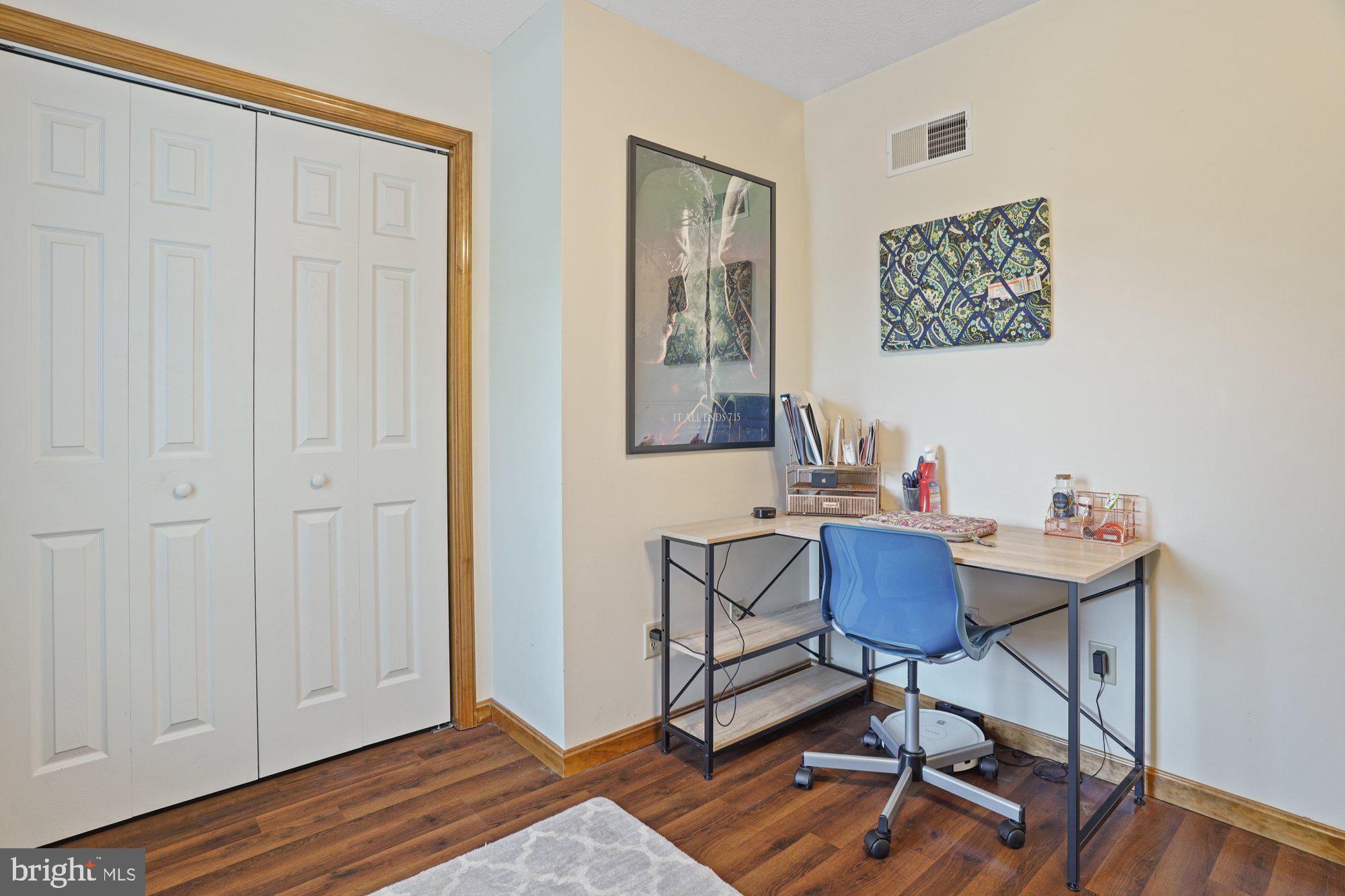 570 Conowingo Road Conowingo, MD 21918 - Photo 14 of 29 a workspace with furniture and wooden floor