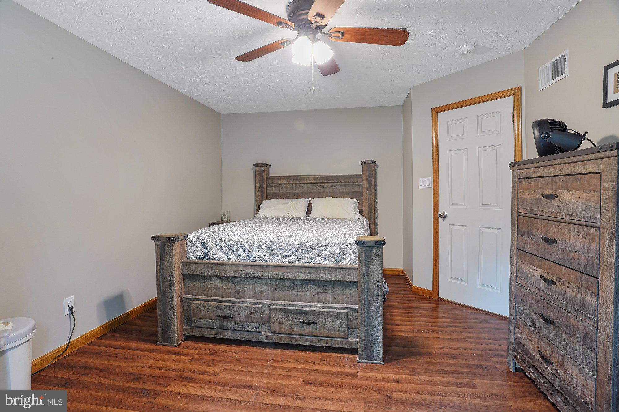 570 Conowingo Road Conowingo, MD 21918 - Photo 15 of 29 a bed room with a bed and a flat tv screen