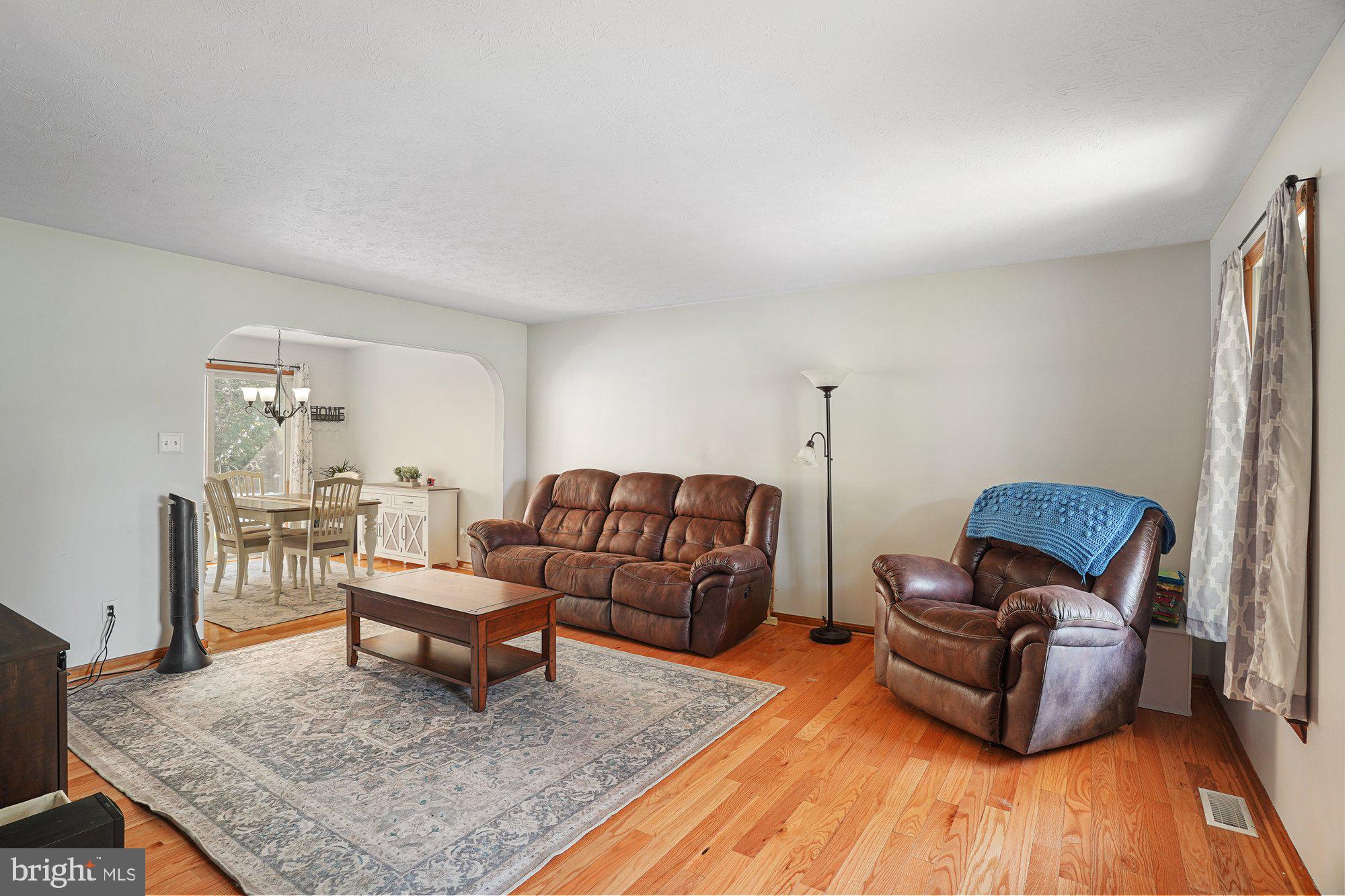 570 Conowingo Road Conowingo, MD 21918 - Photo 3 of 29 a living room with furniture and a rug
