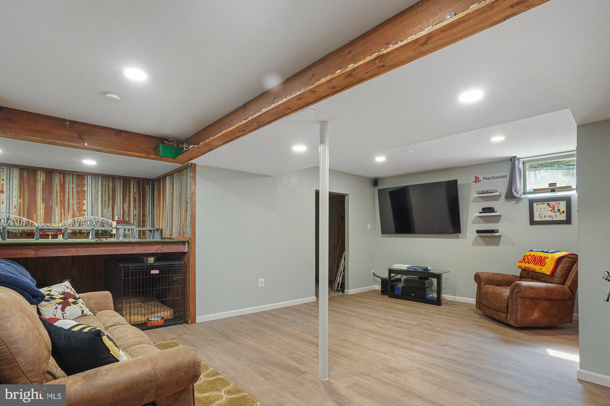 570 Conowingo Road Conowingo, MD 21918 - Photo 21 of 29 a living room with furniture and a flat screen tv