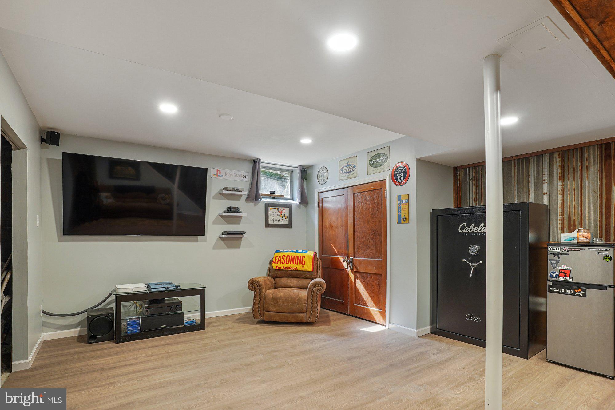 570 Conowingo Road Conowingo, MD 21918 - Photo 22 of 29 a living room with furniture and a flat screen tv