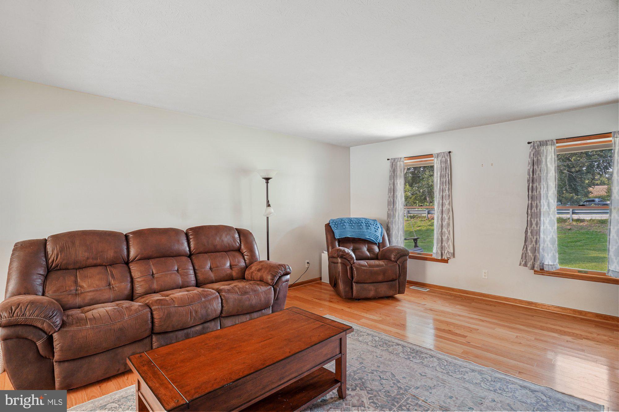 570 Conowingo Road Conowingo, MD 21918 - Photo 4 of 29 a living room with furniture and a window