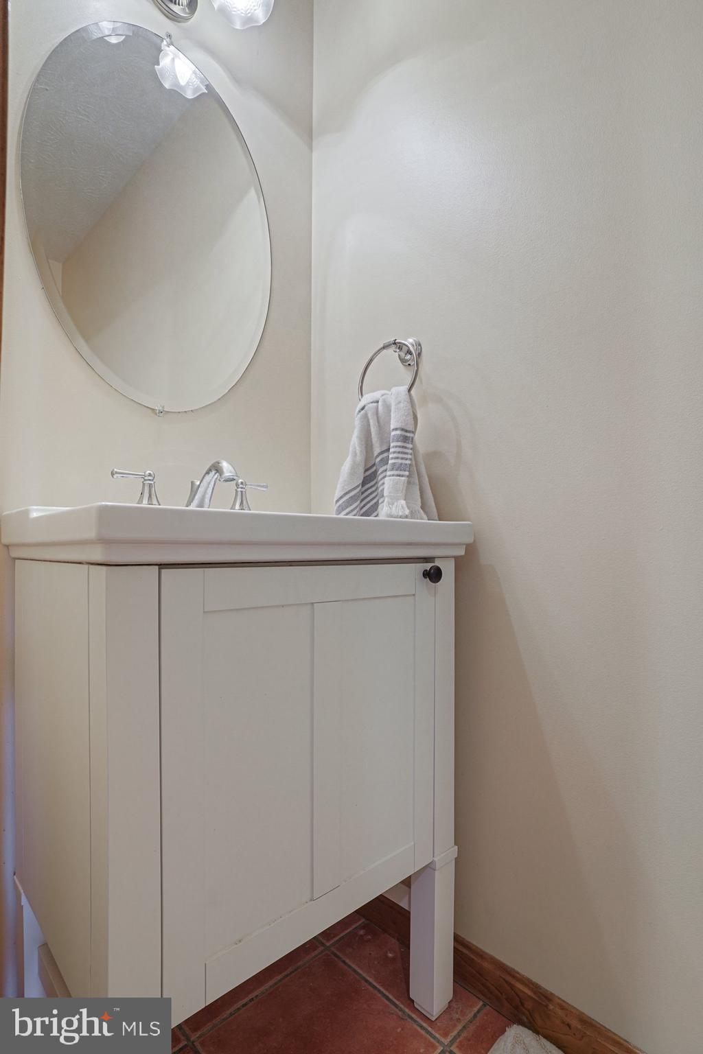570 Conowingo Road Conowingo, MD 21918 - Photo 10 of 29 a bathroom with a sink and mirror