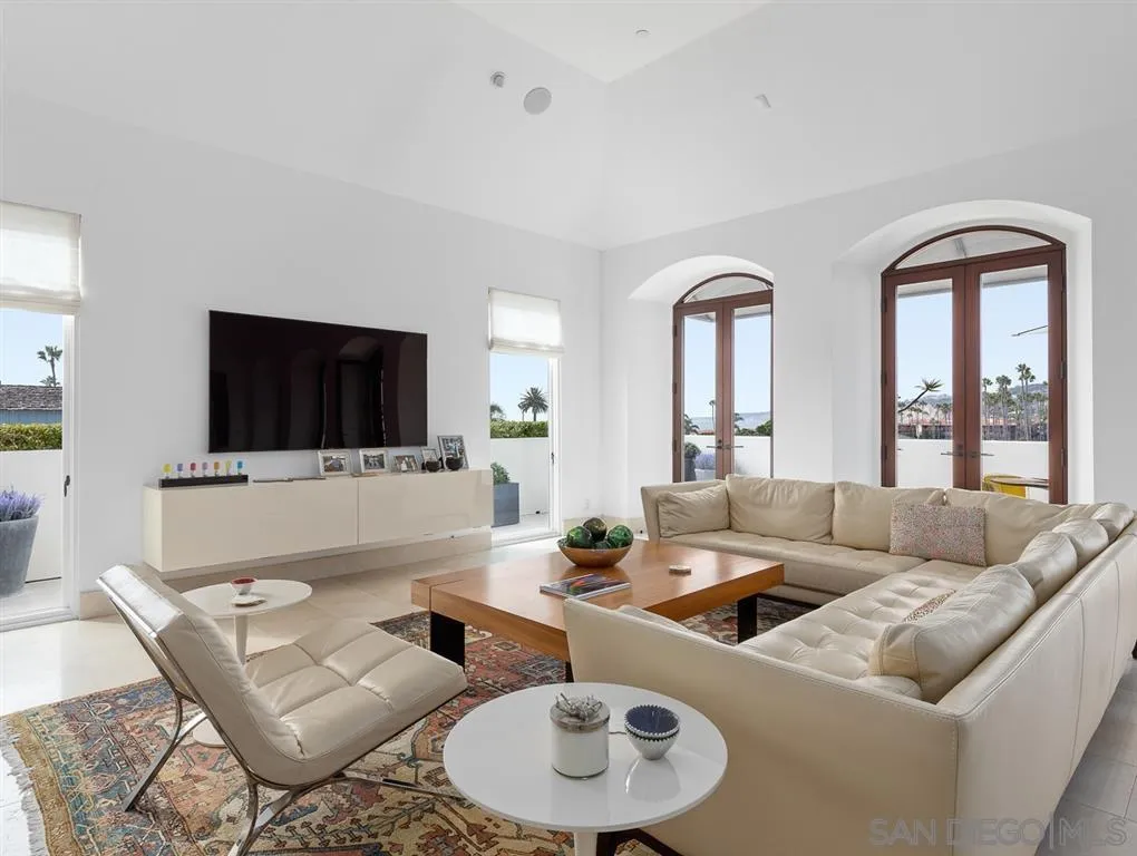 7970 Roseland Drive La Jolla, CA 92037 - Photo 11 of 23 a living room with furniture and a flat screen tv