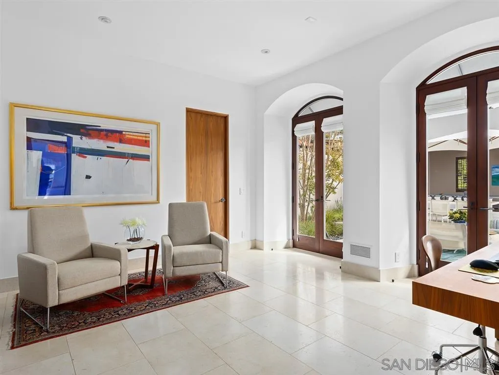 7970 Roseland Drive La Jolla, CA 92037 - Photo 20 of 23 a living room with furniture and a large window