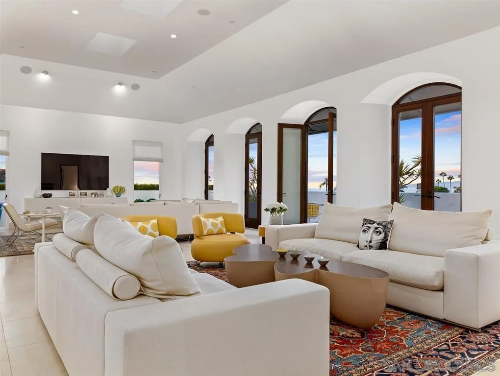 7970 Roseland Drive La Jolla, CA 92037 - Photo 21 of 23 a living room with furniture and a flat screen tv