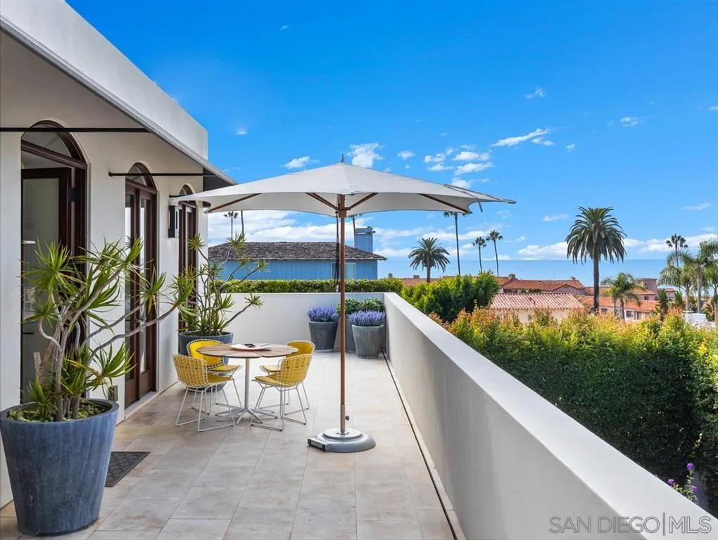 7970 Roseland Drive La Jolla, CA 92037 - Photo 6 of 23 a swimming pool with outdoor seating and plants