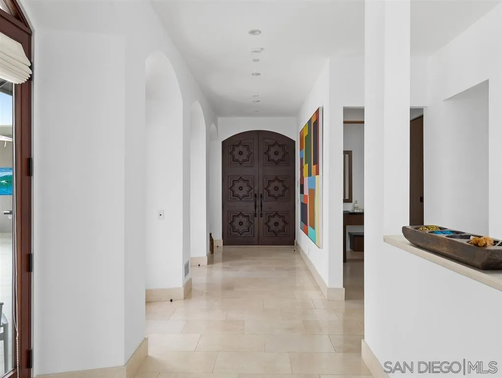 7970 Roseland Drive La Jolla, CA 92037 - Photo 7 of 23 a view of a hallway with entryway