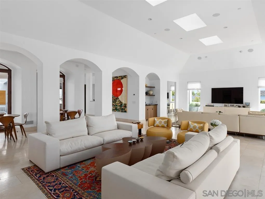 7970 Roseland Drive La Jolla, CA 92037 - Photo 9 of 23 a living room with furniture and a flat screen tv