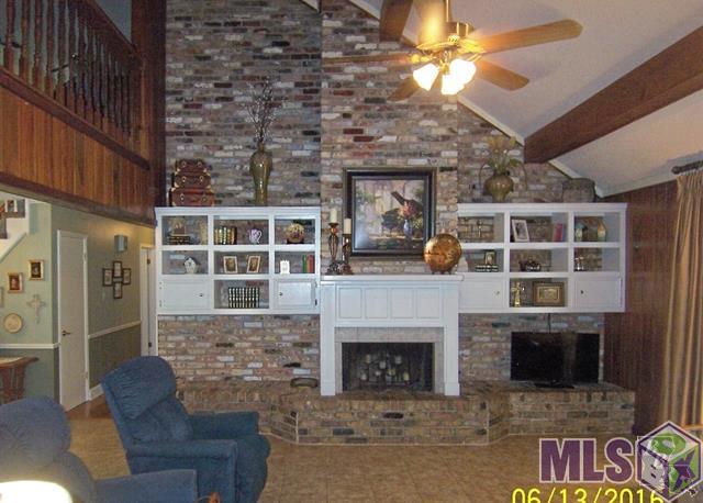 515 Main Project Road Schriever, LA 70395 - Photo 4 of 24 Den - Fireplace & Bookcases