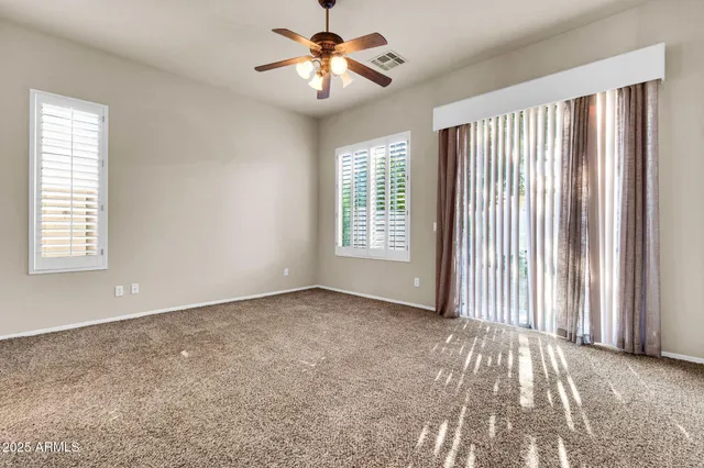 a view of a hallway view with staircase