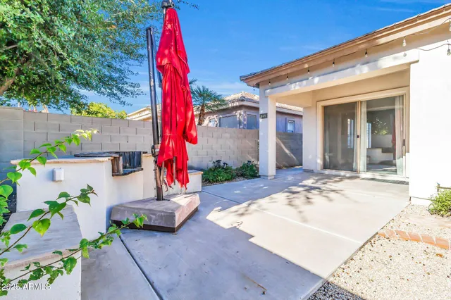 a house view with a backyard space