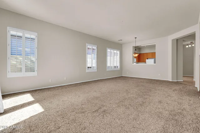 a view of a bathroom with sink and shower