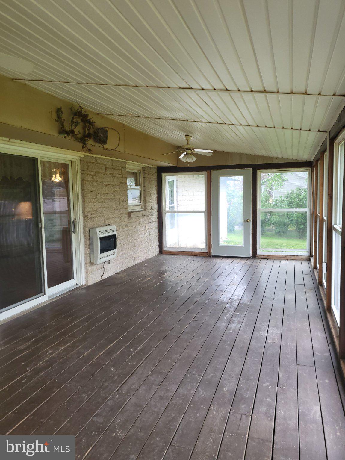 32 Sheetz Road Halifax, PA 17032 - Photo 11 of 20 a view of empty room with wooden floor and fan
