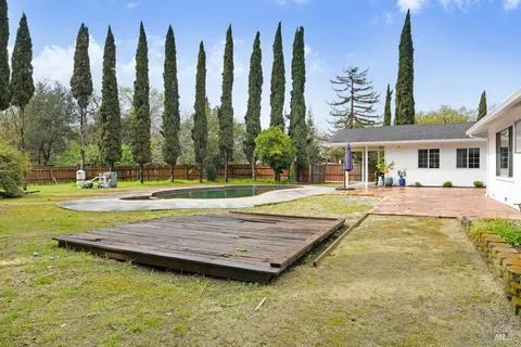 a view of a swimming pool with a building in the background