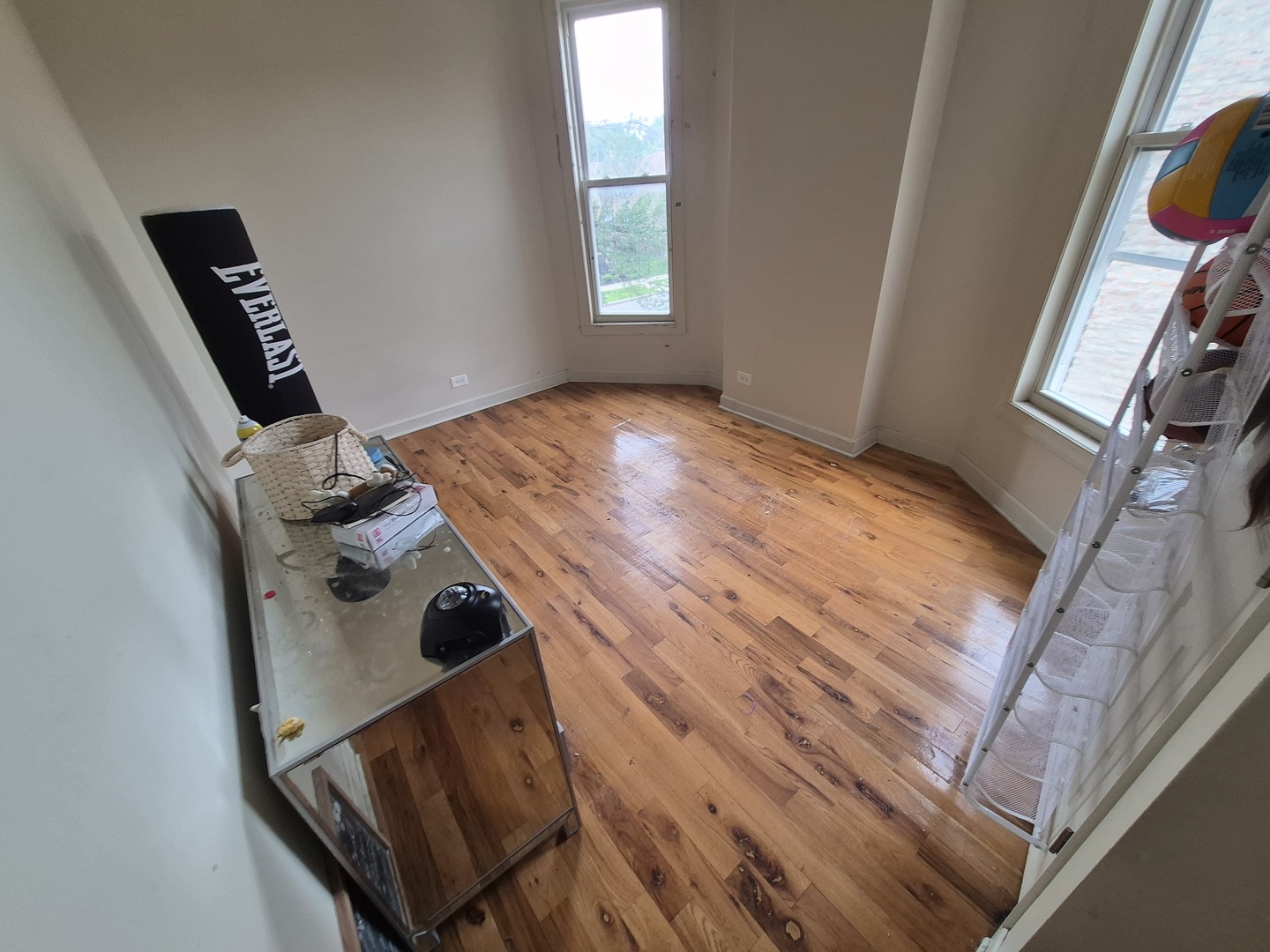 4126 West Adams Street Chicago, IL 60624 - Photo 10 of 19 walk in closet with wooden floor