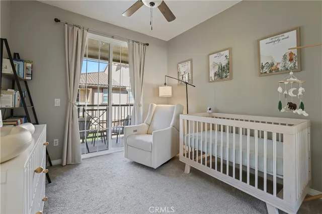 a bedroom with furniture and a window