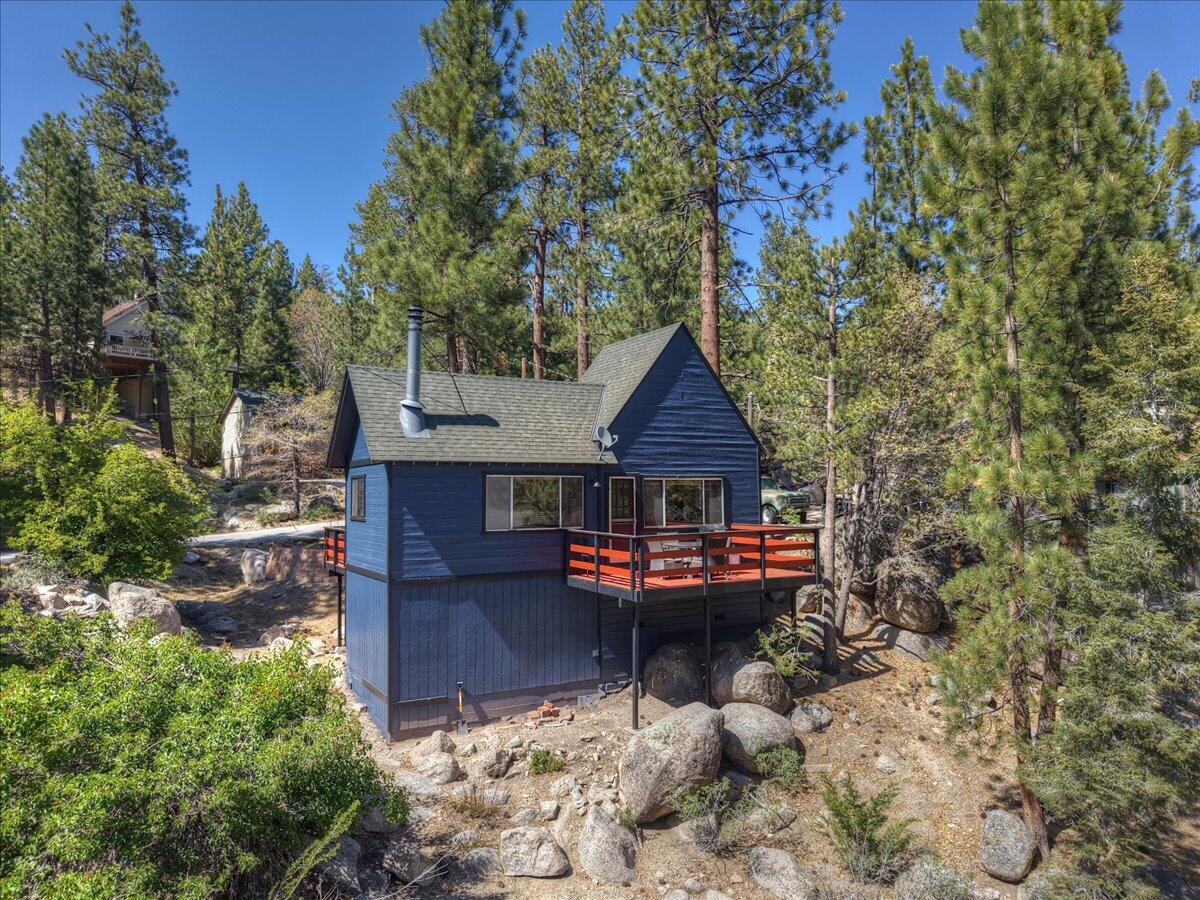 39187 Arapahoe Road Fawnskin, CA 92333 - Photo 28 of 33 an outdoor view of house with outdoor seating