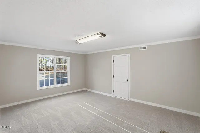 a kitchen with stainless steel appliances granite countertop a stove and a refrigerator
