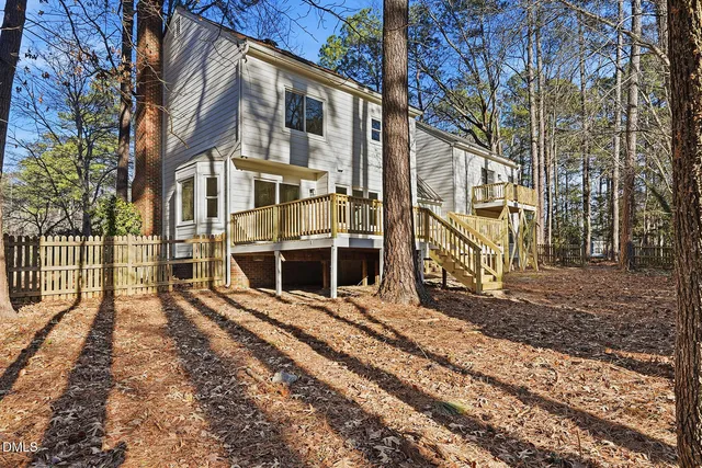 a view of a brick house with a large window