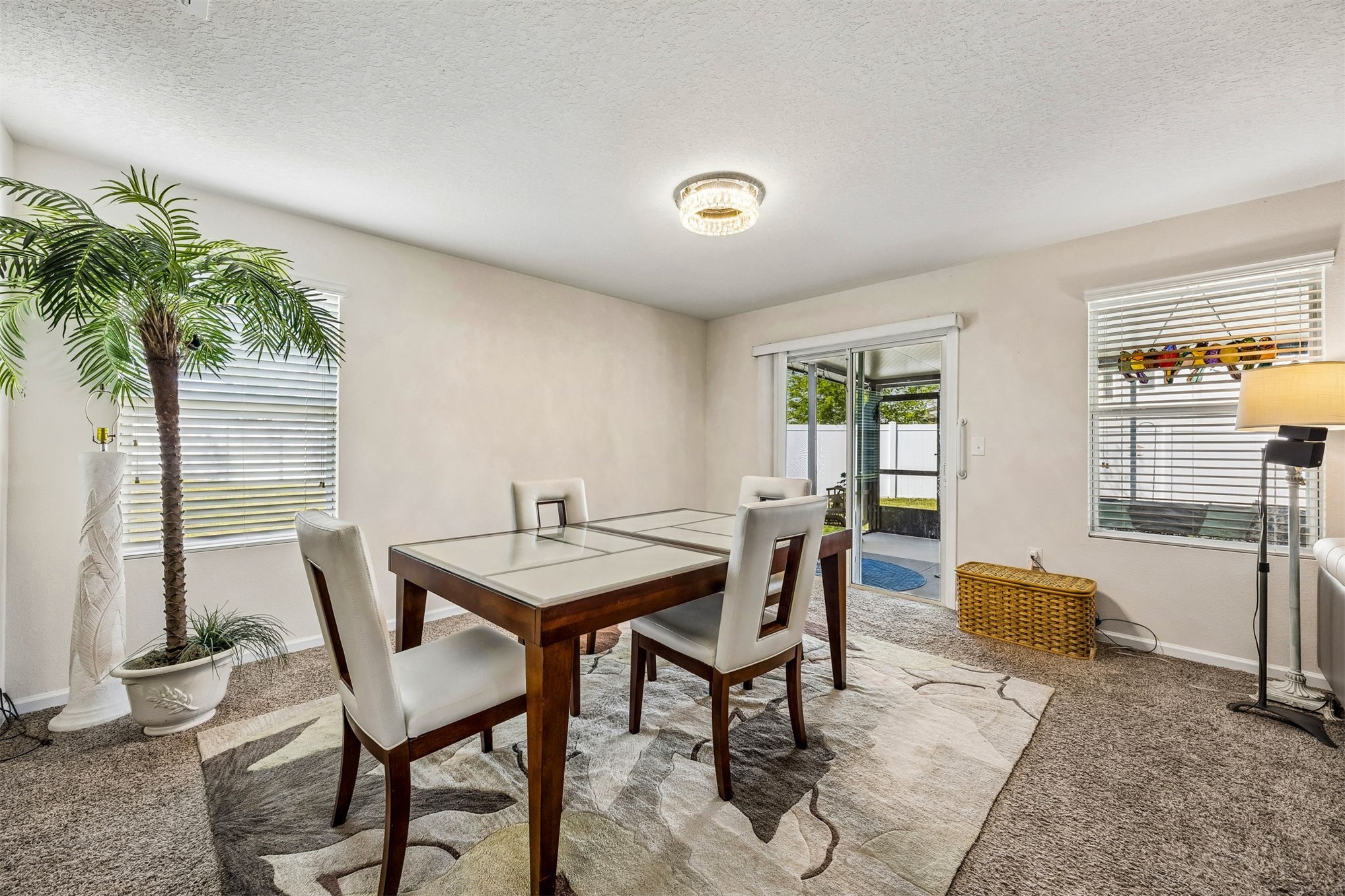 95159 Timberlake Drive Fernandina Beach, FL 32034 - Photo 11 of 33 a view of a dining room with furniture and window