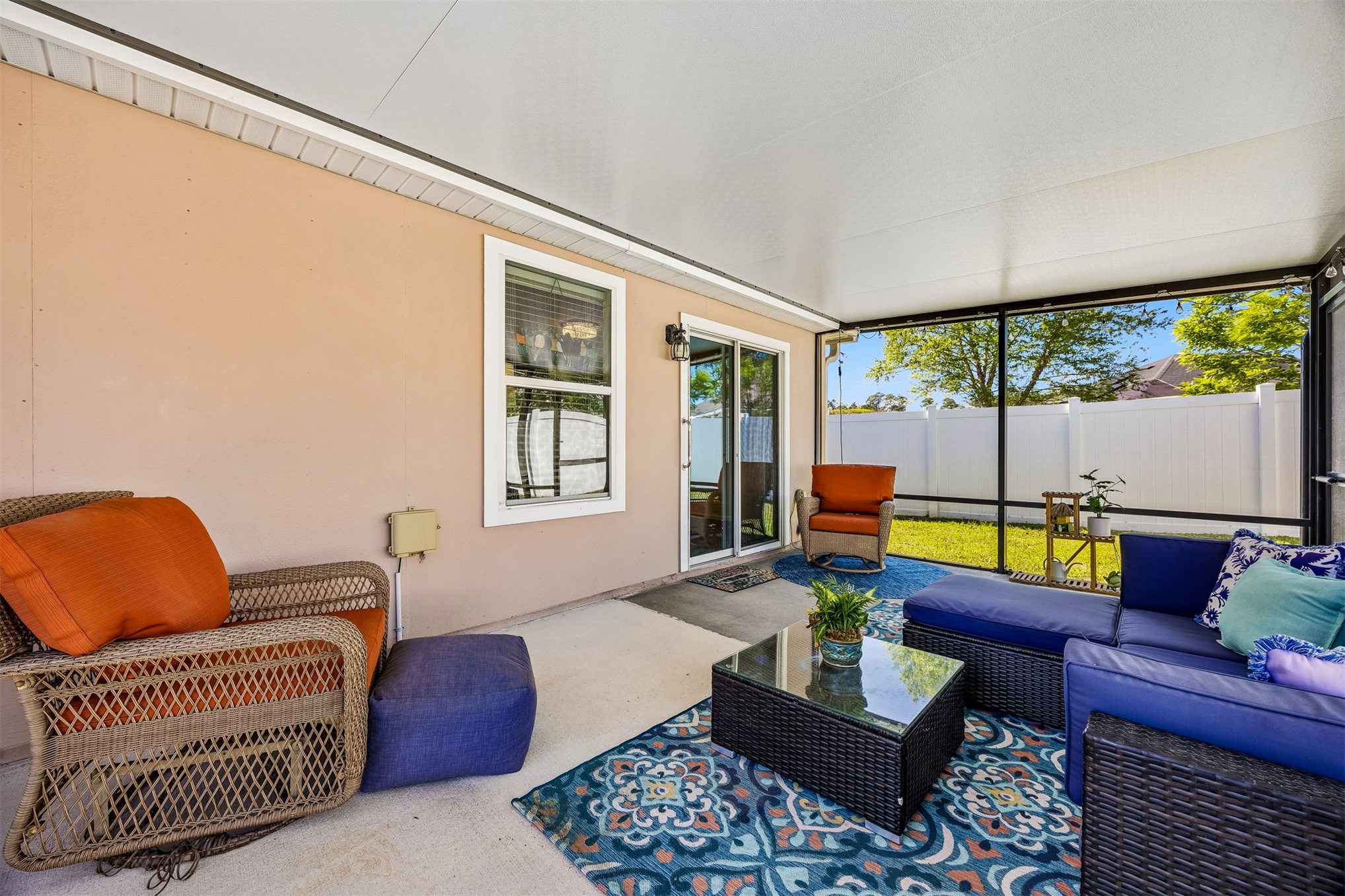 95159 Timberlake Drive Fernandina Beach, FL 32034 - Photo 22 of 33 a living room with furniture and a floor to ceiling window