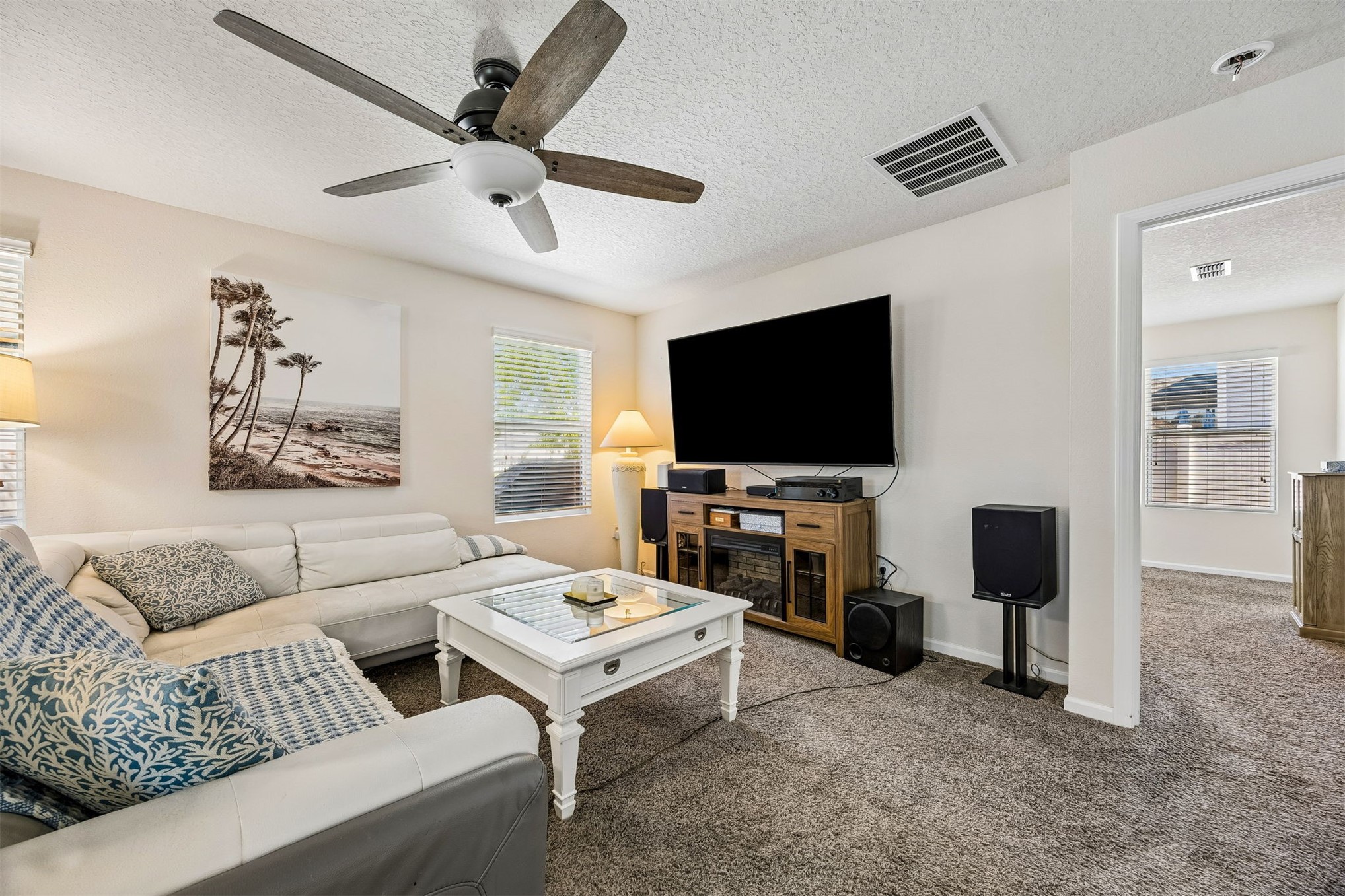 95159 Timberlake Drive Fernandina Beach, FL 32034 - Photo 8 of 33 a living room with furniture and a flat screen tv