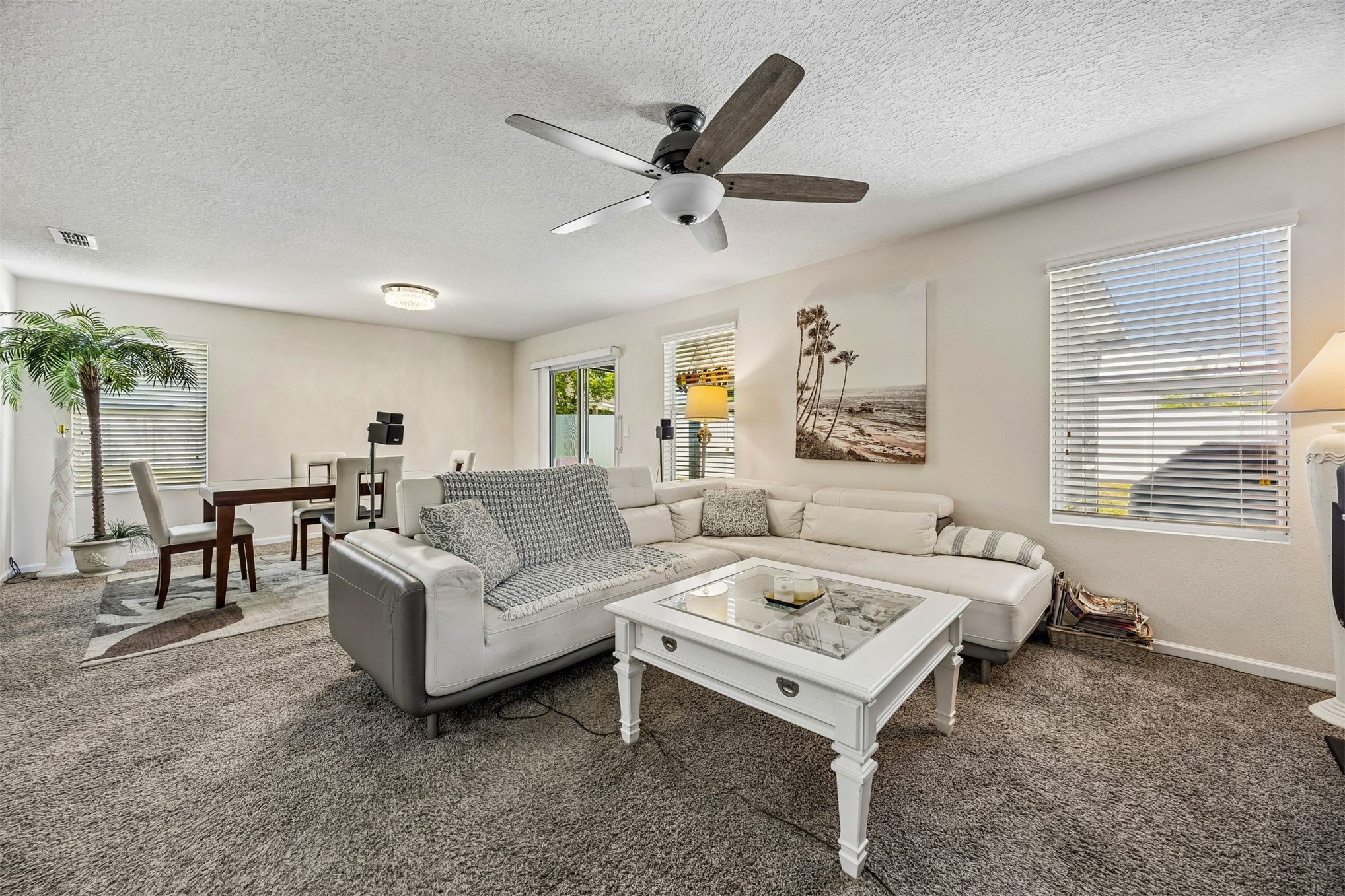 95159 Timberlake Drive Fernandina Beach, FL 32034 - Photo 9 of 33 a living room with furniture and a large window