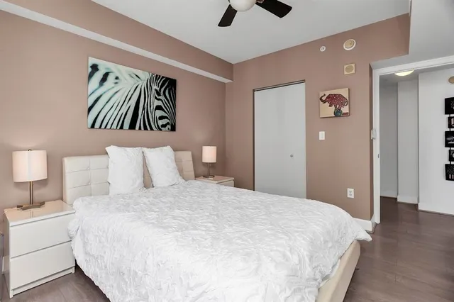 a bathroom with a toilet a sink and shower