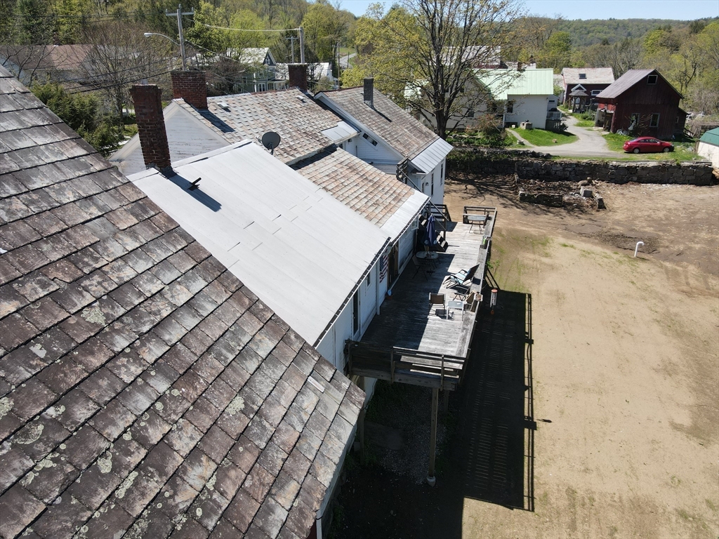 9 Main Road Colrain, MA 01340 - Photo 8 of 40 an aerial view of a house with a yard