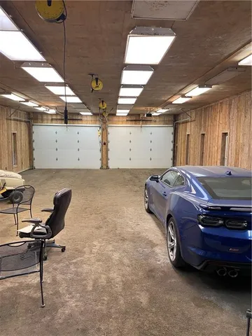a garage with a car parked
